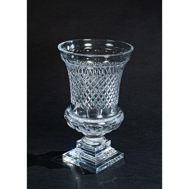 Handcrafted in Italy, this elegant clear crystal vase features a classic flared urn silhouette with intricate hand-cut...