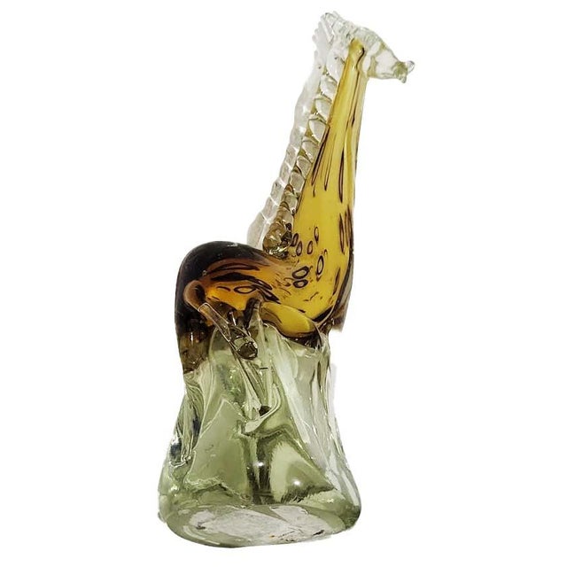 Elevate your space with this striking vintage mid-century modern art glass giraffe figurine, crafted in the iconic Murano...