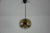 This pendant lamp by koch & lowy for peill and putzler, made in germany in the 1960s, captivates with its beautiful glass....