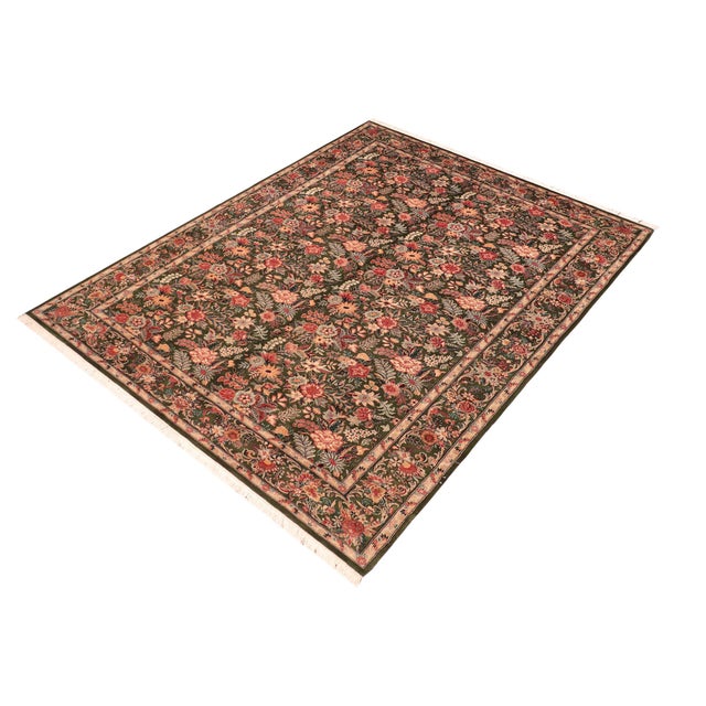 Designed with mesmerizing intricacy and gorgeous color palette, this hand-knotted masterpiece demonstrates the beauty and...