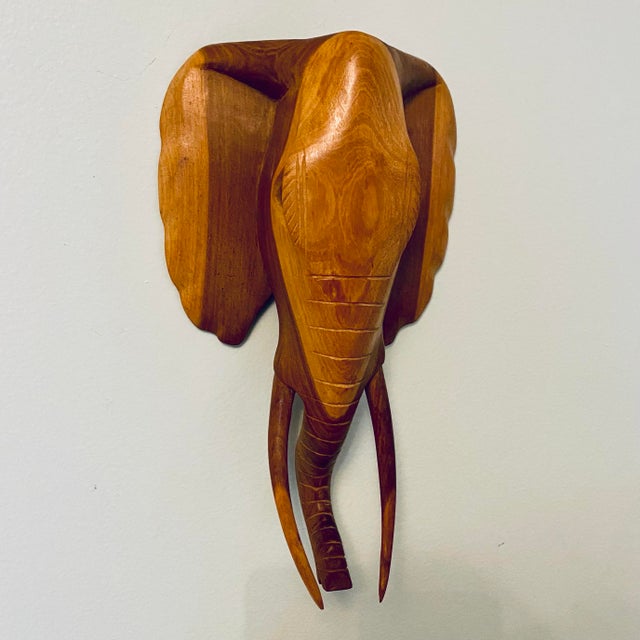 For the lovers of Safari animals, this is a beautiful piece to display on the wall. Hand carved from hardwood, this mask...