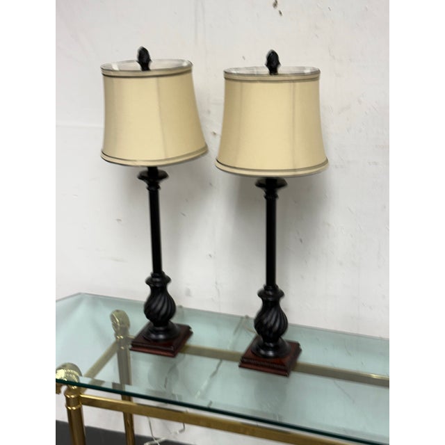 Design Plus Gallery presents a Pair of Neoclassical Laurel Column Table Lamps. They have sculptural twist-form supports,...