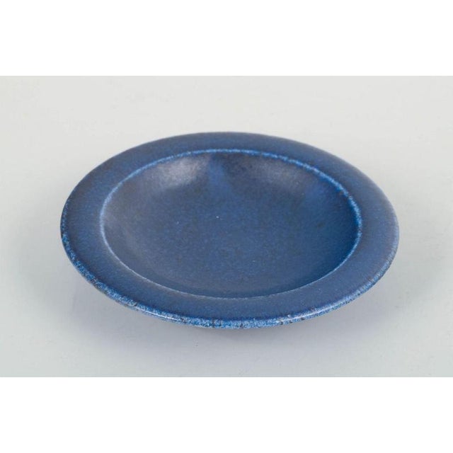 Saxbo Small Dish, Mid 20th Century. Small stoneware dish featuring the characteristic deep blue Saxbo glaze. A refined,...