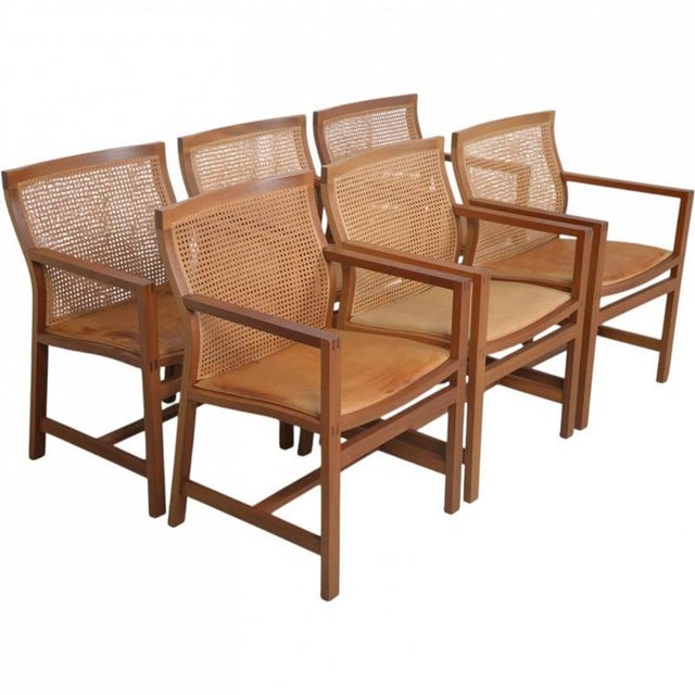 Set of 6 Rud Thygsen & Johnny Sørensen King armchairs with frames of mahogany, wicker backs, and upholstered seats in...