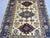 2000 - 2009 Ivory and Blue Kazak Wool Area Rug With Tribal Medallions, 4'10" X 6'7" For Sale - Image 5 of 15