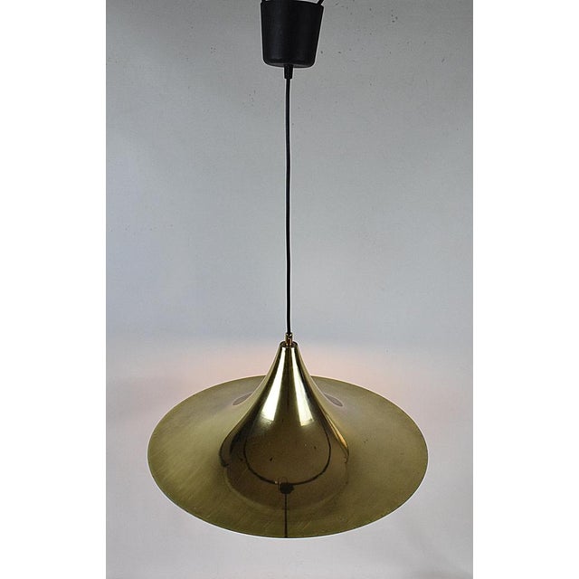 Gold Hanging Lamp, 1970s, in Good conditions. Designed 1970 to 1979 Up to 250V (Europe/UK Standard).The wiring of this...