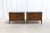 Offered is a stunning pair of mid-century modern nightstands manufactured in the 1960s. Crafted from rich walnut wood,...