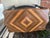 Refinished console table with stunning diamond veneer top. The base has been painted navy and has an ornamental gold...