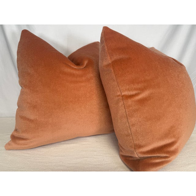Custom pair of 22" pillows covered in a peach mohair. These pillows have tapered corners to prevent dog ears, serged...