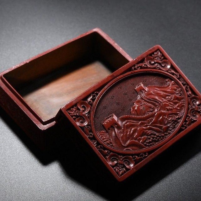 This exquisite vintage box is a fine example of traditional Chinese carved lacquer artistry. The rectangular lid features...