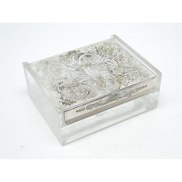 Humidor was produced in Germany by the WMF label in the 70s. It is made of art deco style. The lid is decorated with...