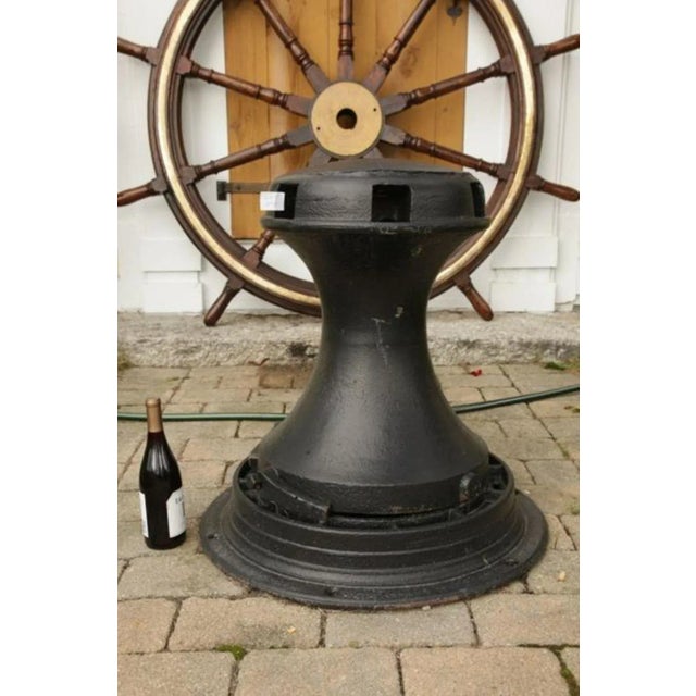 Large and heavy 19th century iron ships capstan with geared base. Overall dimensions: 29" H x 26" W.