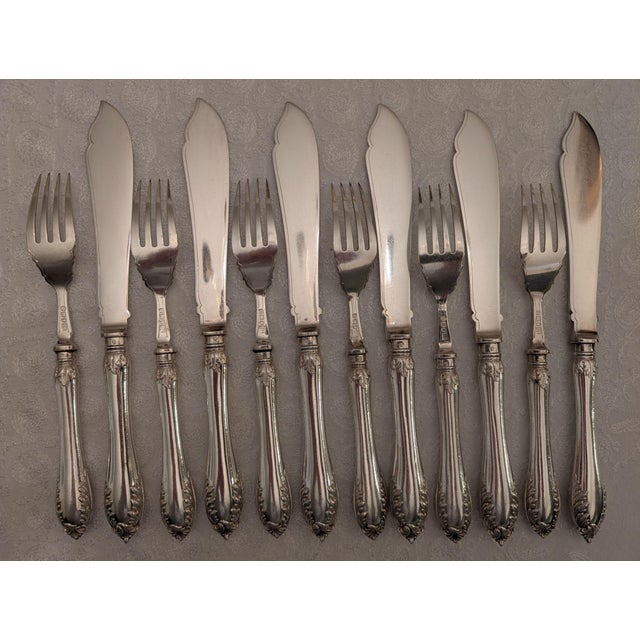 Six sets of Victorian fish knives and forks by London silversmiths Mappin Bros. circa 1865/70. (Became Mappin & Webb in...