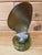 Unusual vintage nautical folk art piece created from the broken blade and hub of an authentic marine propeller, mounted...