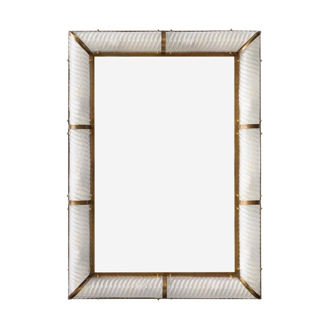 Mirror from the island of Murano, Italy outside of Venice. This piece has a brass structure with hand-blown white glass...