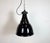 Vintage Industrial black enamel pendant lamp in Bauhaus style. Used in factories in former Czechoslovakia during the...