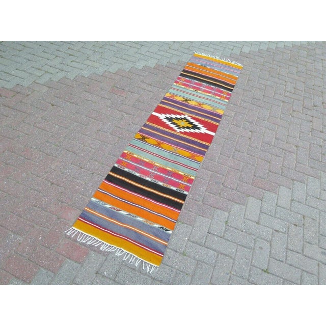 This beautiful, traditional vintage, hand knotted Turkish runner is approximately 60 years old. It is handmade of very...