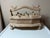 Teak wood with antique finish. Decorative footed display box to hold spices or tea. Tiny compartments with removable lids...