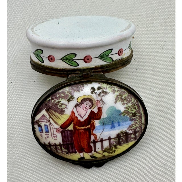 A 19th Century French Enamel on Copper Patch Trinket Box by Samson. A very charming scene, of a young child has a pet Bird...