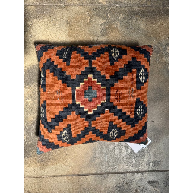 Infuse your space with bold character and rich history through this antique 19th century Caucasian kilim throw pillow....
