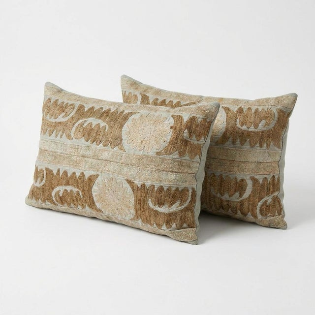 This beautiful 17'' x 24'' & 17'' x 25'' hand-embroidered Suzani pillow cover set was made from authentic Uzbek cotton...