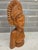 An exceptional, gallery-tier mid-century Balinese modernist portrait bust depicting a traditional ceremonial Legong...