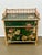 This cabinet is decorated with colorful flowers against dark green background. and “tortoise” style bamboo. It is very...
