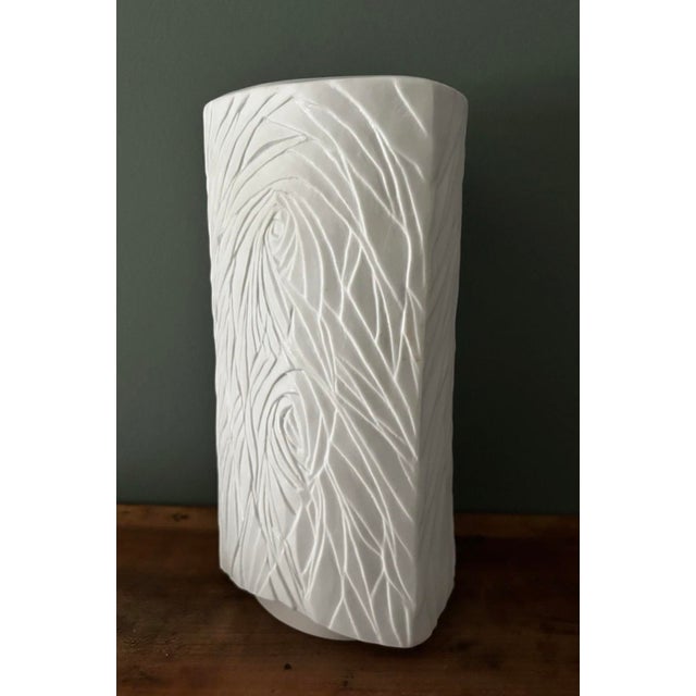 Striking vintage Israeli Naaman Artline crisp white porcelain vase circa 1970's/1980's. The vase stands 9.5" high x 4.75"...