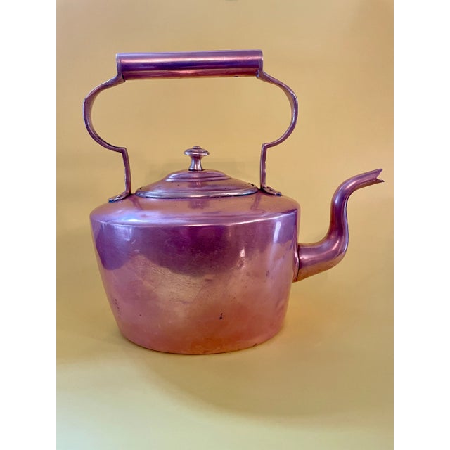 Lovely 19th Century copper tea kettle to add warmth to your kitchen or dining room collection. Purchased from an antique...