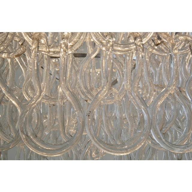 Chandelier designed by angelo mangiarotti. Italy, vetreria vistosi, 1967. large chandelier with plenty of handblown...