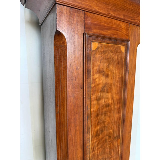 Fine and rare inlaid late 18th century Shenandoah Valley of Virginia walnut tall case clock, likely made by Jacob Fry and...