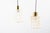 This pair of ceiling lamps by Helena Tynell and Heinrich Gantenbrink were manufactured by Glashütte Limburg in the 1960s....