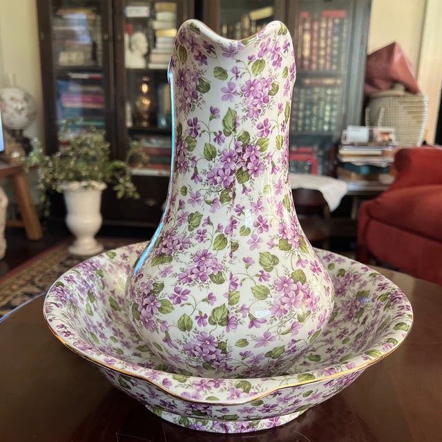 Beautiful vintage pitcher and basin set. Basin marked A Special Place, Made in China 2003. Hand Wash Only. A great...