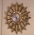Bring a radiant touch to your home with this eye-catching gilt wood sunburst battery operated clock. Hand-carved in Spain...