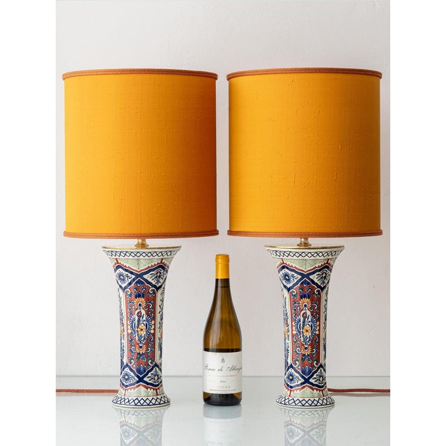 Polychrome delft style. Pair of belgian mid-century ceramic trumpet vase table lamps from boch frères, la louvière,...