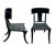 Klismos black dining chairs. The chairs are made of solid alder with a satin finish and leather strapping. The chairs are...