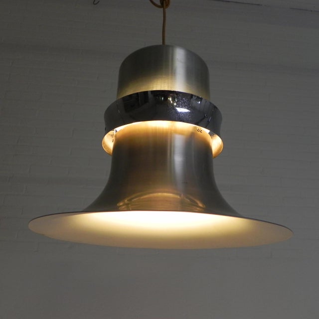 Height: 37 cm. Ø: 45 cm. Origin: Sweden, 1970s. This lamp has a large bulb holder (E27). The chrome has some spots and the...