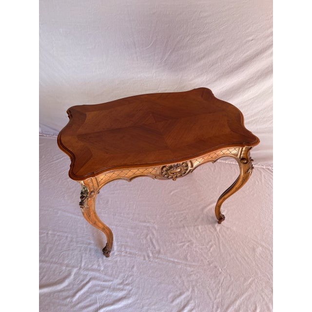 Stunning 19th Century French Louis XV Style Table. Flowing rectangular top leading to rounded edges, masterfully detailed...