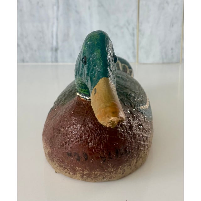 This rustic hand painted wooden duck decoy would add a bit of folk art warmth and texture to your home. Hand painted in...