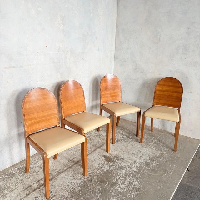 An elegant set of four Art Deco burr walnut dining chairs , showcasing beautifully figured walnut veneer backs with a...