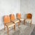 An elegant set of four Art Deco burr walnut dining chairs , showcasing beautifully figured walnut veneer backs with a...