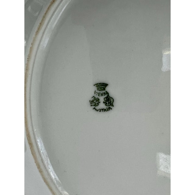 Lovely hand painted dish with gold trim, Great for wall display or serving piece.