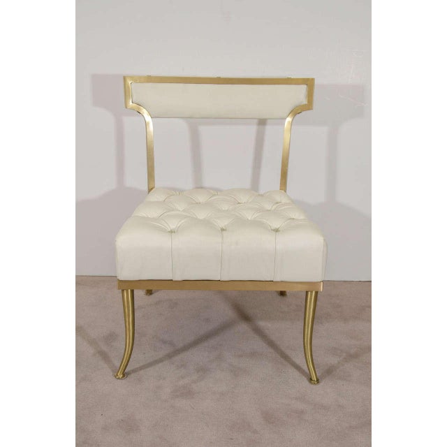 Stylish Hollywood Regency period Billy Haines designed chairs. Consisting of a four comfortable chairs of stylized klismos...