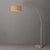 The Float Arc Lamp is a modern arc lamp designed by Peter Morelli in 1960, featuring a satin nickel steel frame and a...