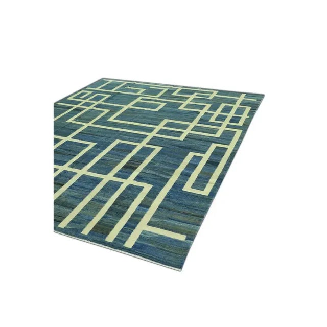 Turkish Handmade Kilim Rug Blue Beige Geometric Design – 8'5" X 10'7" This striking modern Turkish flatweave Kilim rug is...