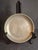 This exceptional, museum-grade piece of early 18th-century European metalware is a shallow pewter bowl (or deep...