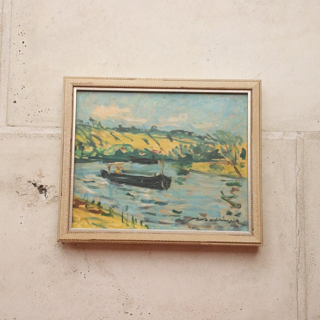 20th Century French Pastel Town Painting captures a tranquil waterside landscape rendered in a light, expressive hand,...