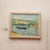 20th Century French Pastel Town Painting captures a tranquil waterside landscape rendered in a light, expressive hand,...