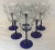 Nice set of six matching crystal blue stem wine glasses!