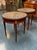 The product is a set of two 19th Century French Directoire Mahogany Boulliotte Tables, exuding a classic elegance. Made...